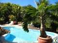 Photo Villa méditerranéenne avec piscine et vue lagon