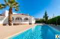 Photo Villa de style méditerranéen avec piscine et garage