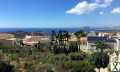 Photo Belle villa de plain-pied avec vue mer.