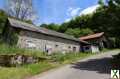 Photo CORREZE. Proche Eymoutiers. Grange et hangar en pierre avec terrain de 2 472m2.