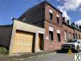 Photo Maison de ville avec garage motorisé et jardin