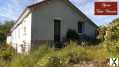 Photo A LINARDS, Ensemble immobilier sur 1410m².