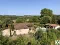 Photo Belle maison avec piscine et jardin paysager