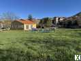 Photo Deux maisons 4 faces sur un grand terrain plat