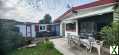 Photo Maison de plain pied avec garage et annexes