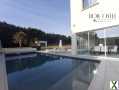 Photo Maison contemporaine. Beaux volumes. Lumineuses. Piscine. Jardin. Garages.