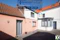 Photo Immeuble avec local commercial et maison