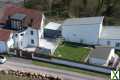 Photo Ensemble immoblier comprenant une maison et un local commercial
