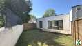 Photo Maison Individuelle de Plain-Pied avec Jardin et Garage