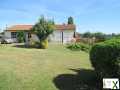Photo Ensemble de deux maisons sur terrain constructible et divisible