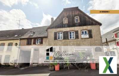 Photo Immeuble avec appartement et local commercial