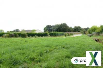 Photo Terrain constructible de 1500m2 situé à Ménesplet