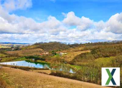 Photo Superbe propriété avec 3 maisons, 3 gîtes, terrains et un lac privé