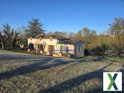 Photo Propriété en pierre avec dépendances